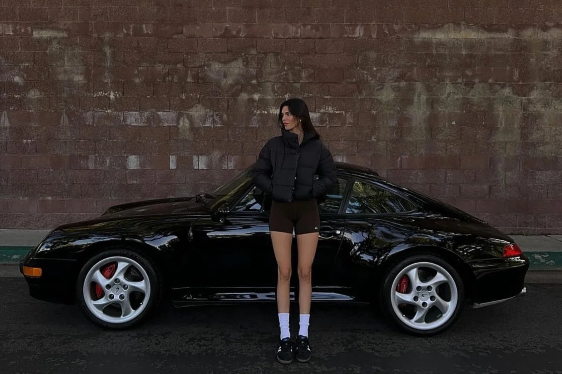 The star of the collection appears to be a 1997 Porsche 993 Carrera 4S, finished in black and equipped
