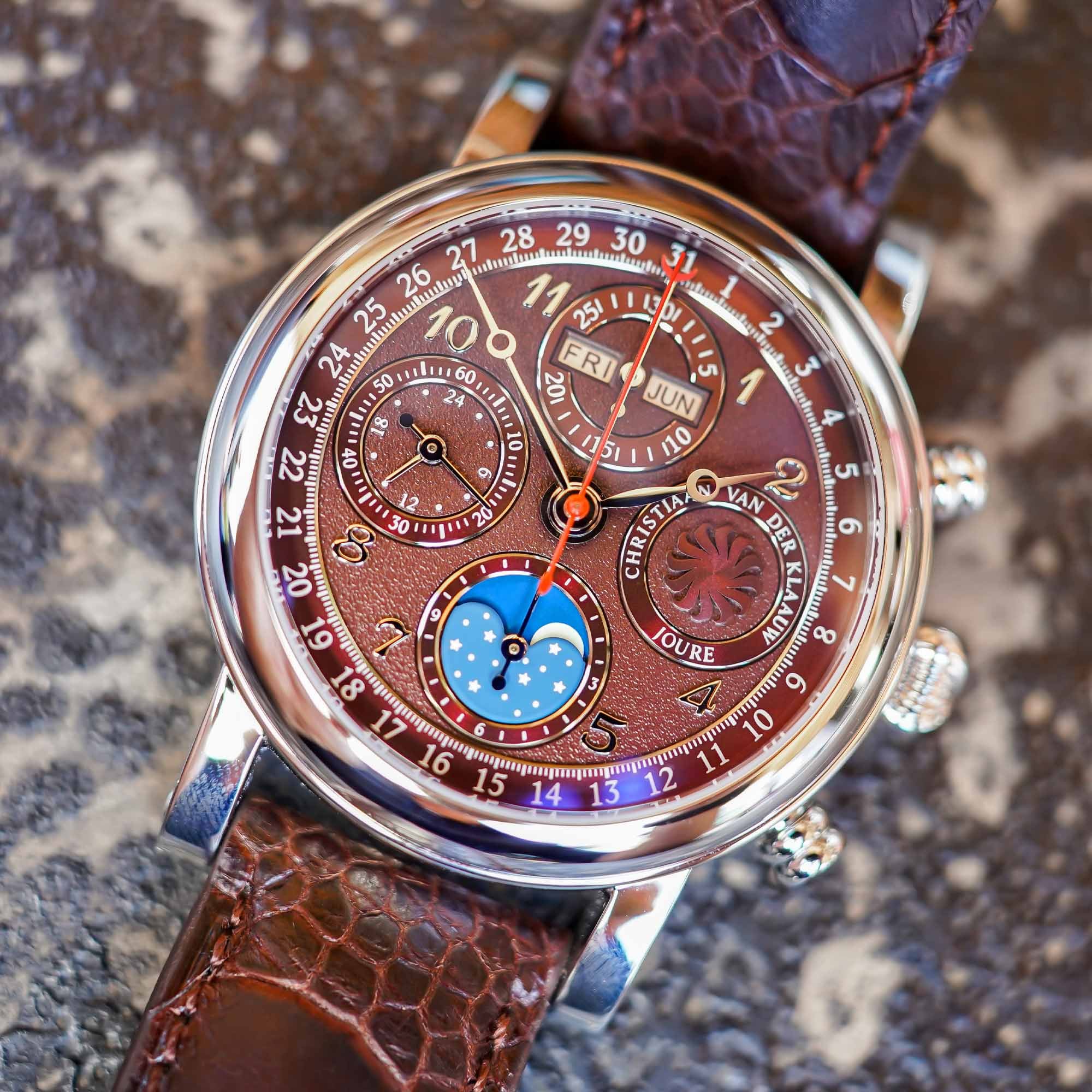 The watch features a 40mm polished stainless steel case topped by sapphire crystals on both the front