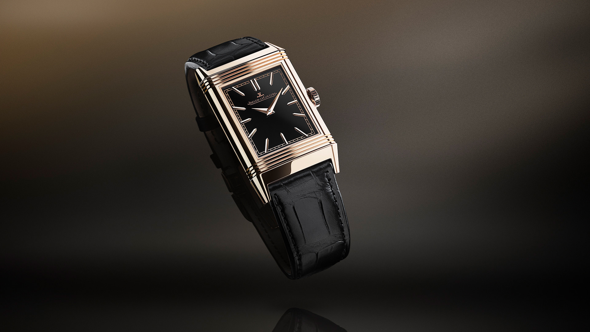 The Jaeger LeCoultre Reverso Tribute Enamel Horse presents its rectangular architecture in an 18ct pink gold case