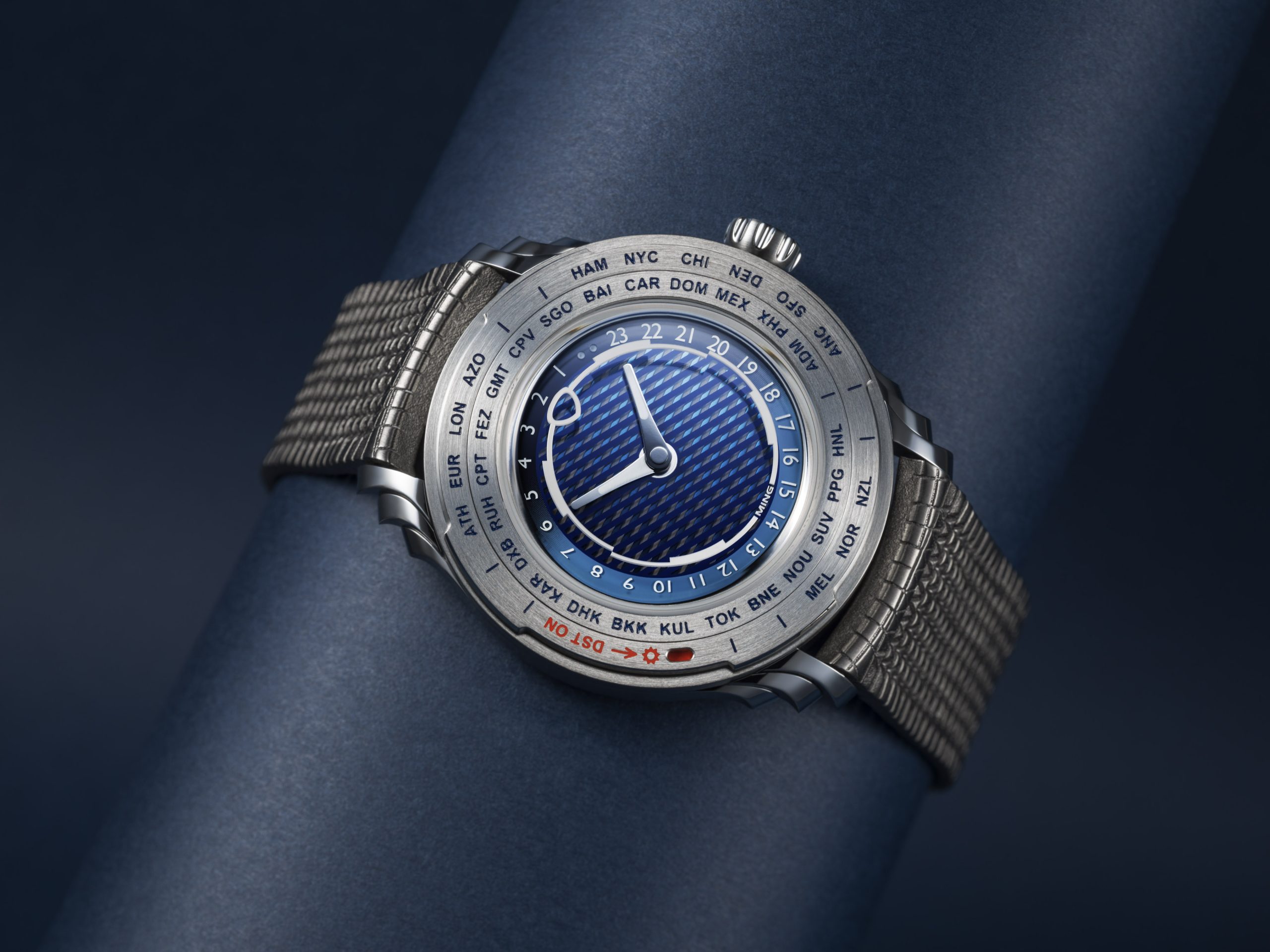 Here is a world-timer that treats a change of time zone as an occasion