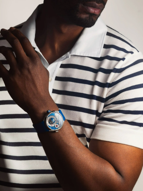 Most watches are content to tell the time, but this one puts a miniature terrestrial globe