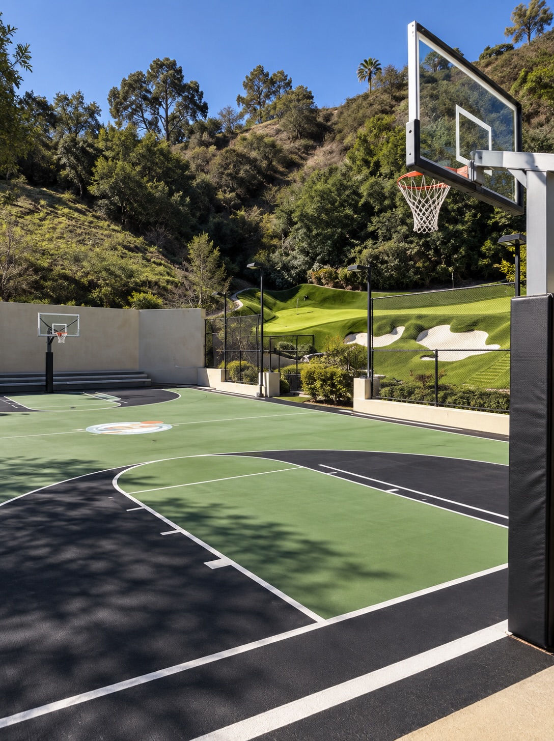 The grounds include an oversized sports court