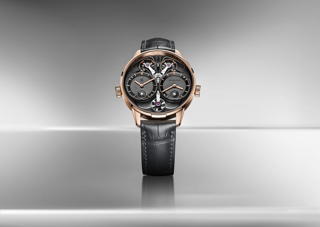 A Dual Time watch shows the second time zone through a separate, dedicated display, typically a second hour hand, a subdial