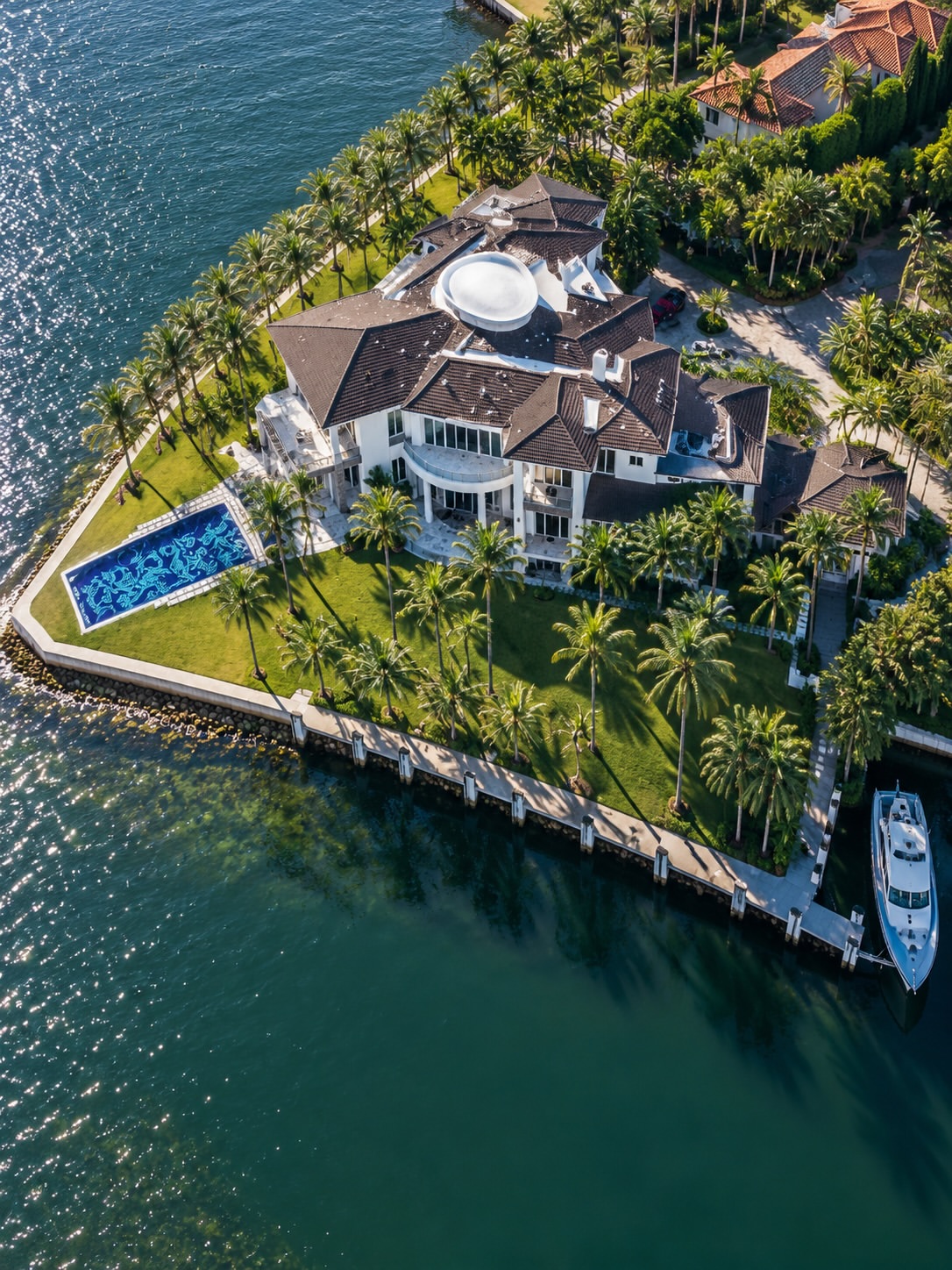 The estate sits at 41 Arvida Parkway, within the exclusive, gated Gables Estates enclave, on a 1.24-acre lot that occupies a