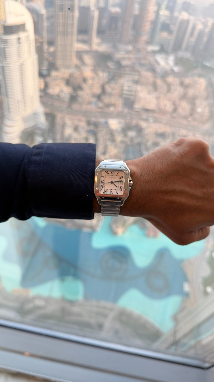 The Santos is pure design: the square case, the exposed screws, the Roman numerals.