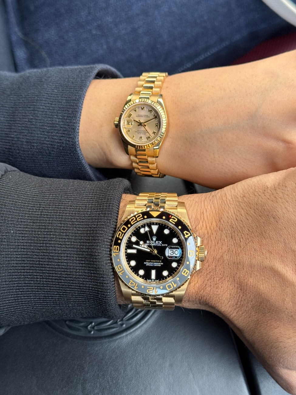 Two watches, for very different reasons. The first is the GMT-Master II in full yellow gold, the gris noir