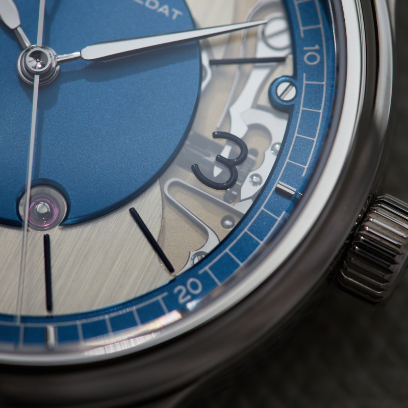 In a standard mechanical watch, the seconds hand sweeps continuously, a motion carried directly from the balance wheel's oscillation