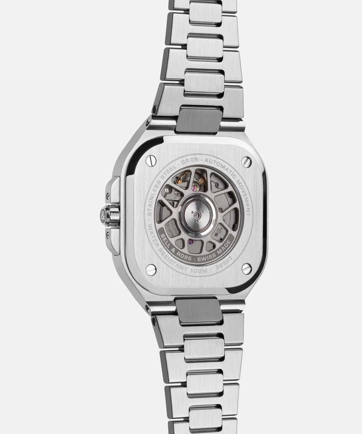 Baignoire-style rhodium-plated indices and skeletonised hands, all filled with green-glowing