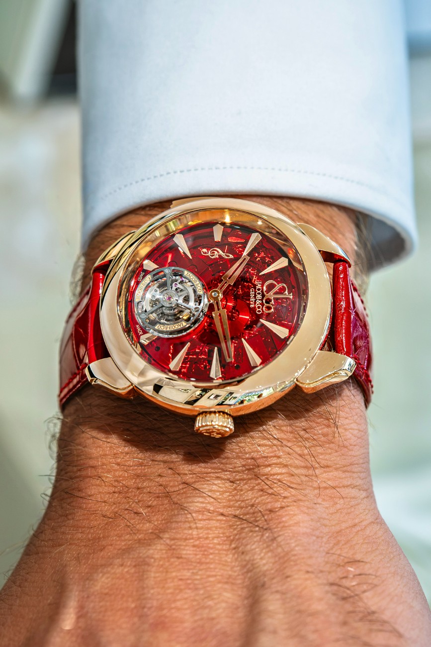 Housing the mechanism is a 43mm round case crafted in 18K rose gold