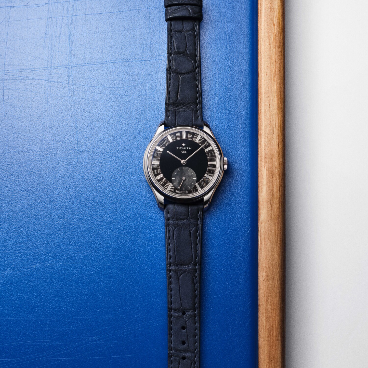 Zenith’s G.F.J. in tantalum is a study in density and restraint. The 39.5 mm case keeps the stepped bezel and sculptural lugs