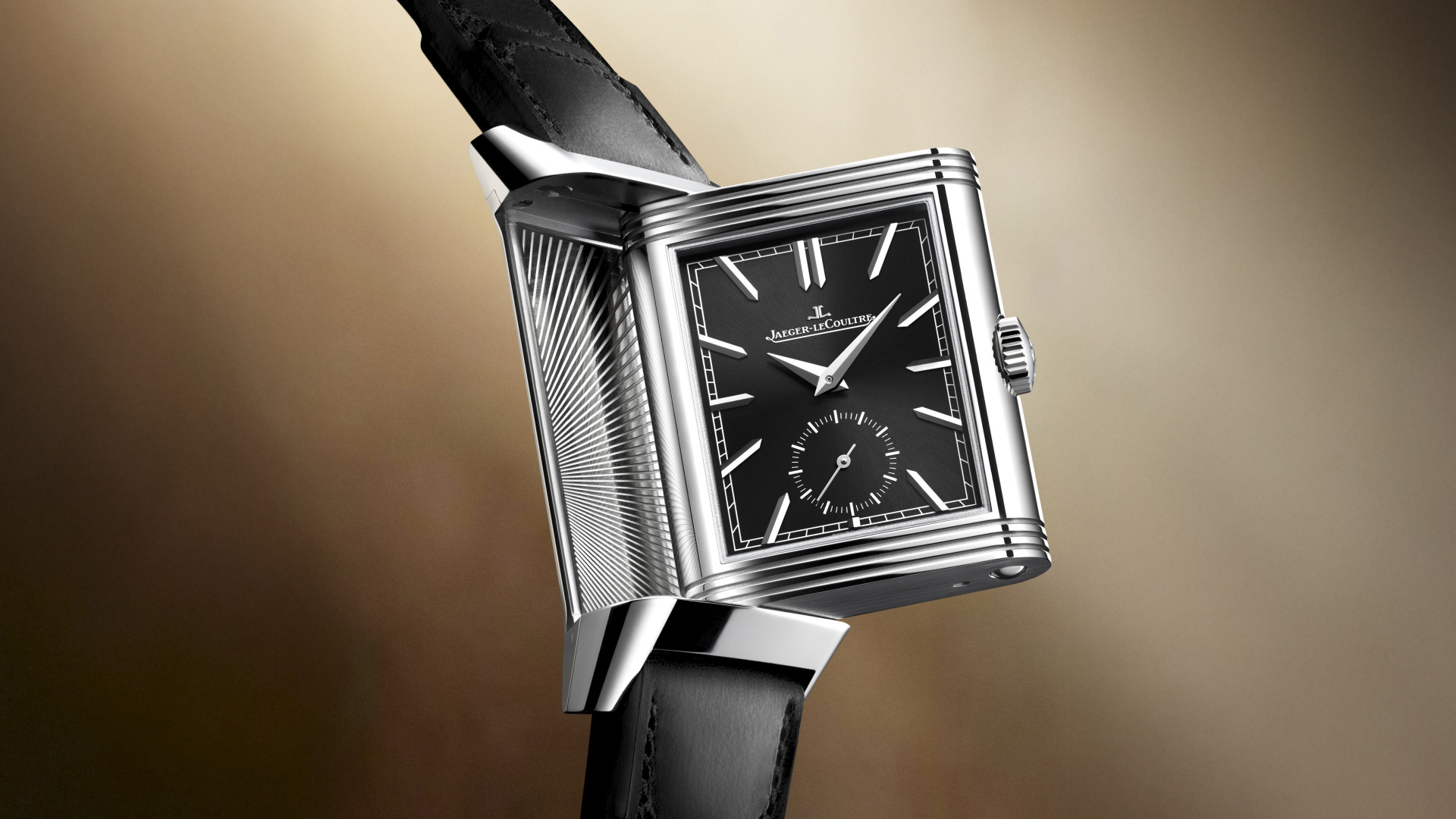 Jaeger-LeCoultre’s Reverso Tribute Duoface Small Seconds in black pairs the Reverso’s Art Deco