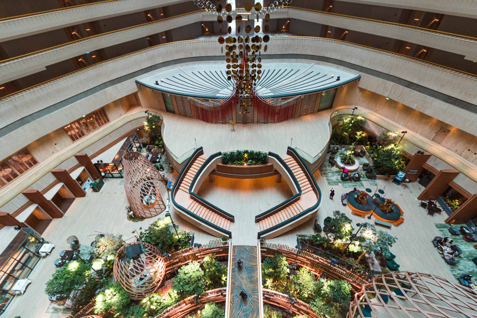 Few lobbies surprise quite like this one, where the bold architecture of John Portman meets a garden growing indoors