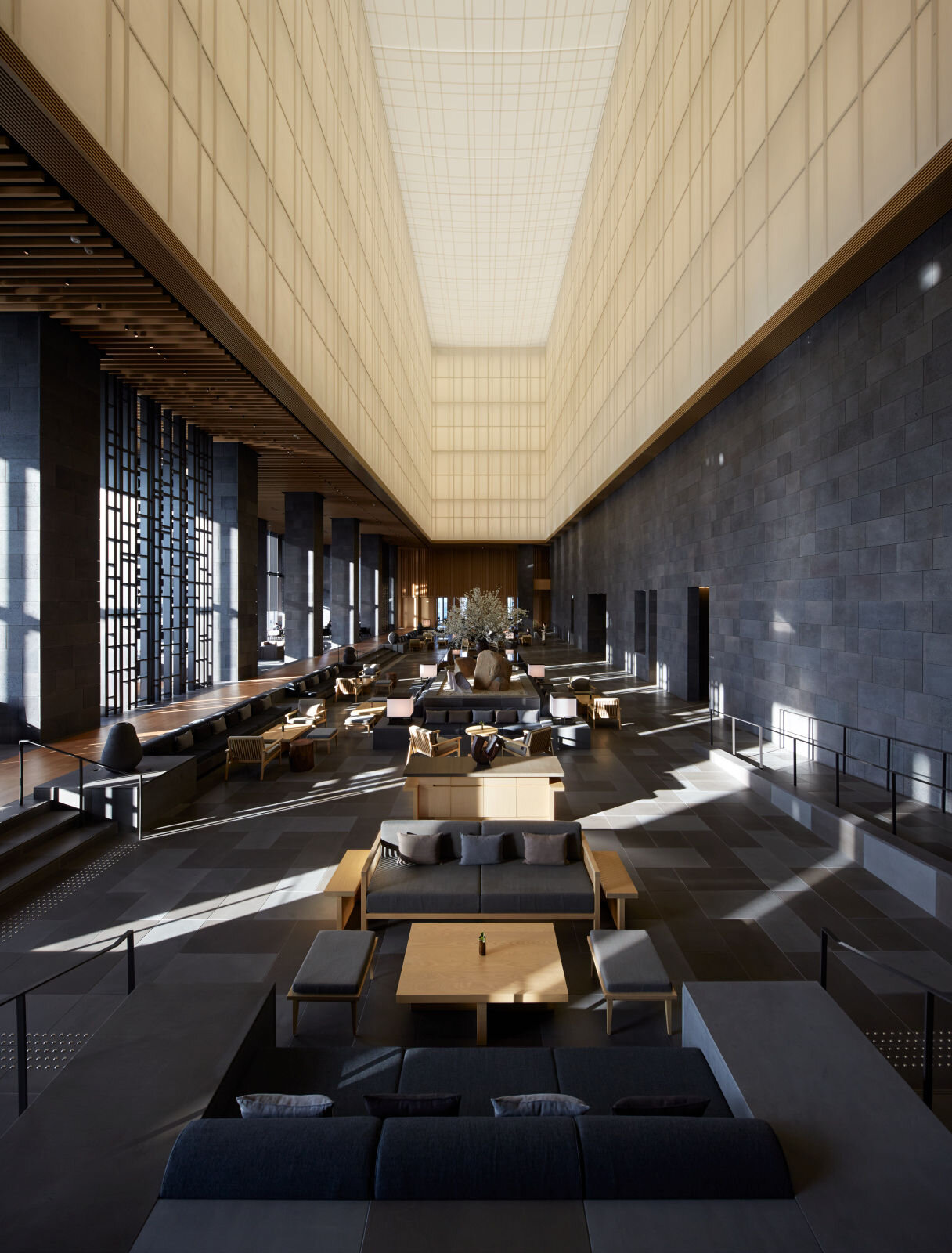 At Aman Tokyo, the welcome begins with stillness. Above the bustle of the Otemachi district