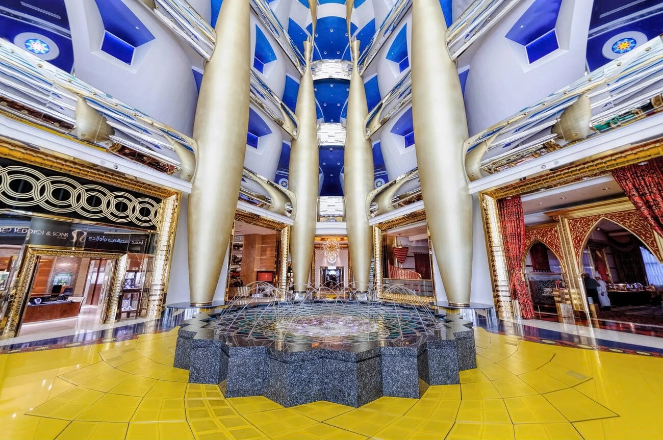 If any lobby were built to astonish, it is this one. The Burj Al Arab’s atrium soars roughly